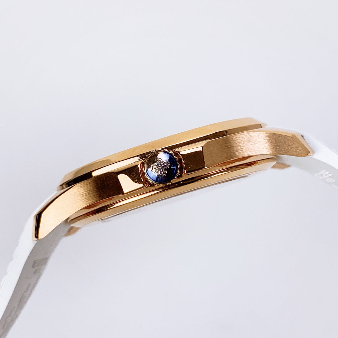 Aquanaut cassa oro cinturino bianco