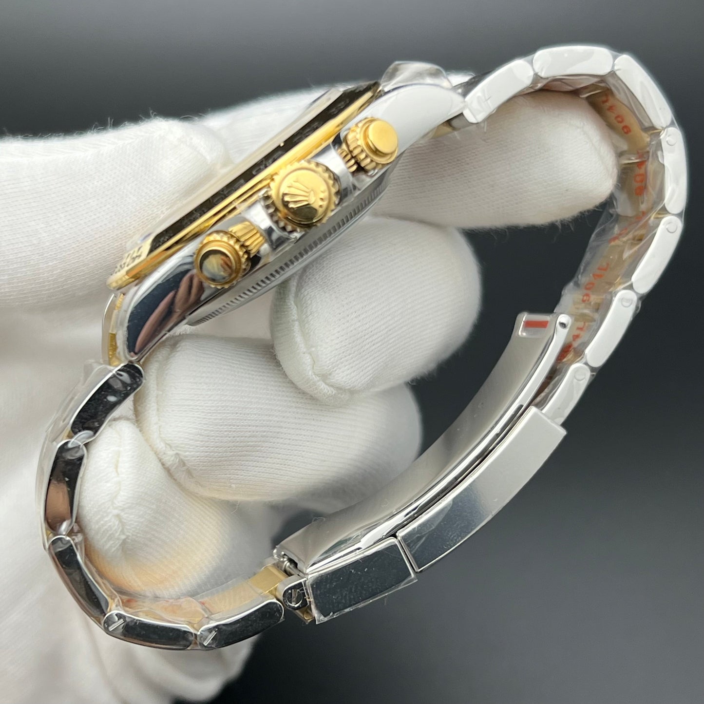 Daytona acciaio oro giallo 18k quadrante nero
